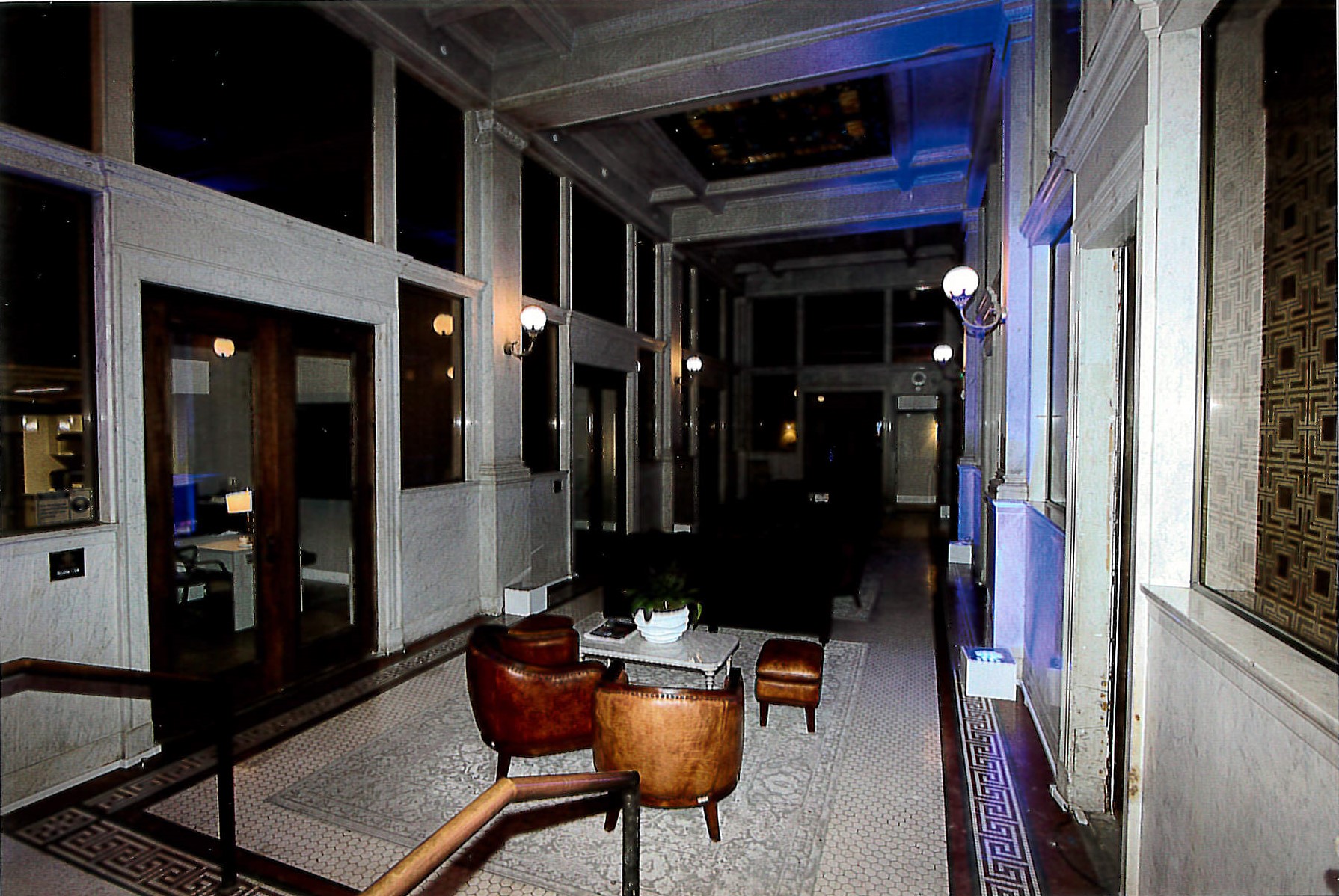 First floor lobby corridor, featuring original marble and stained-glass in ceiling. New mosaic tile continued from entrance.  